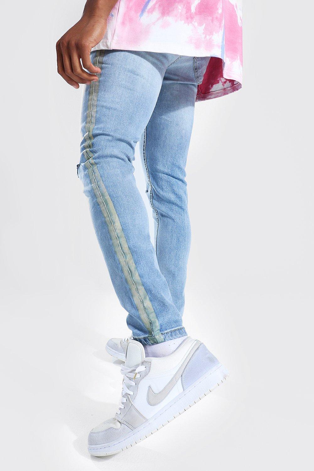 Side stripe deals ripped jeans